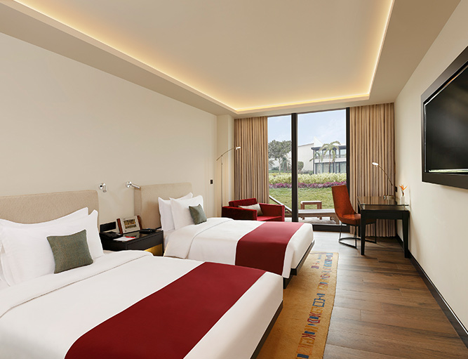 The Deluxe Rooms rooms at Tiger Palace Resort, Nepal blend modern sophistication with a touch of the exotic to envelop you in a plush embrace.